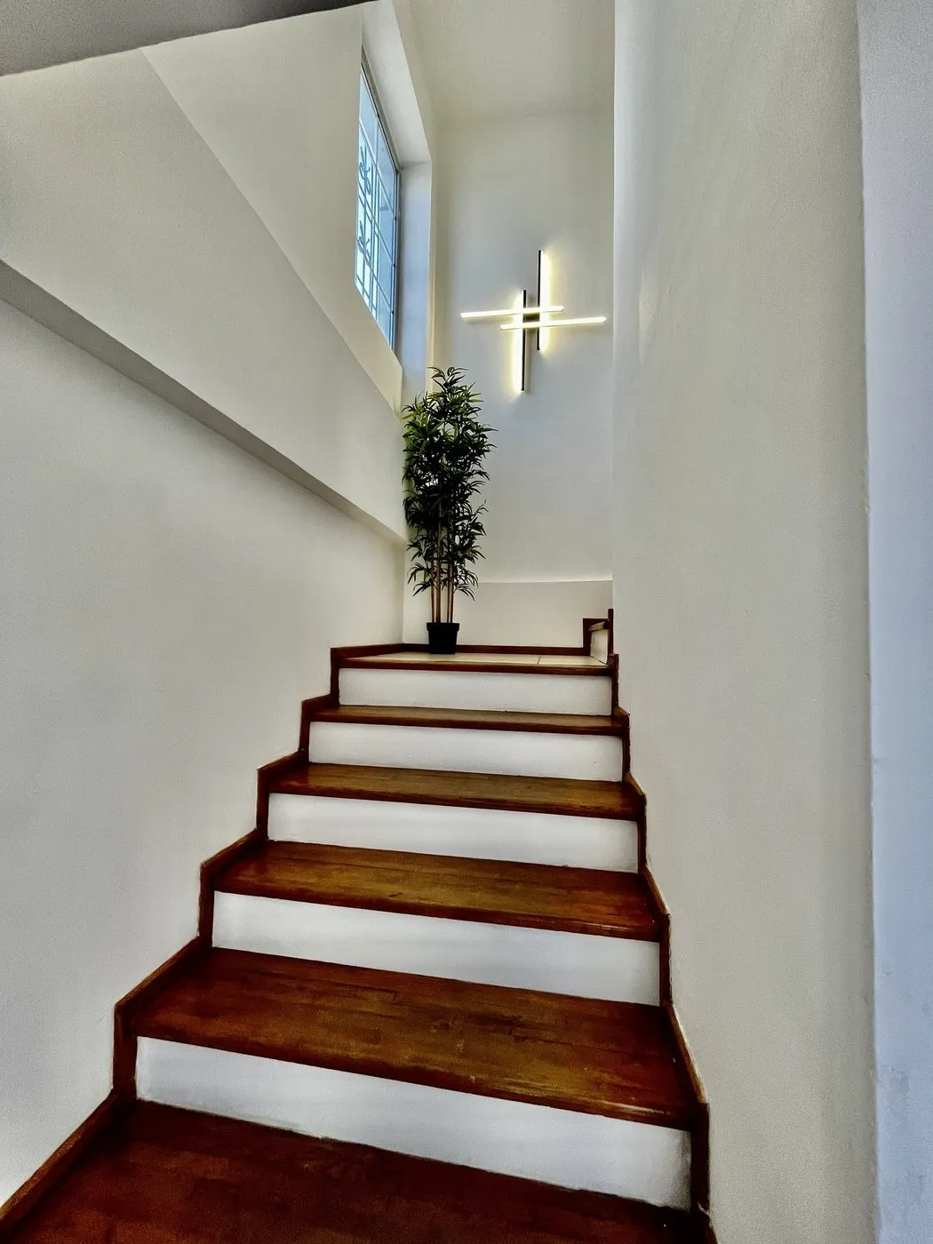 Staircase with wooden steps leading up to the practice